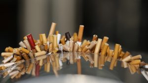 Extinguished cigarettes are seen in an ashtray at the Shanghai Railway Station